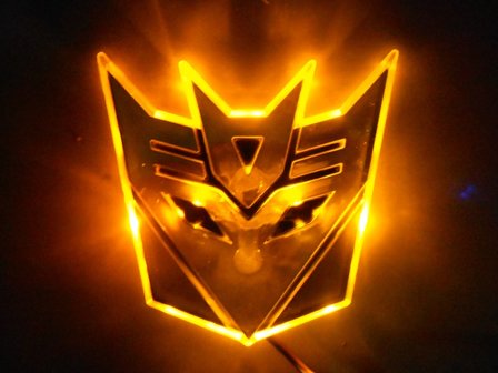 Transformers Septicon LED badge geel